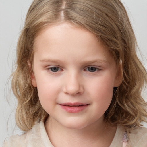 Joyful white child female with medium  brown hair and grey eyes