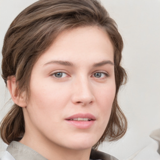 Neutral white young-adult female with medium  brown hair and grey eyes