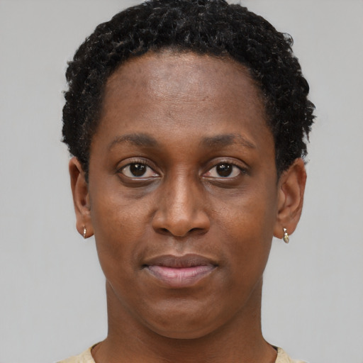Neutral black young-adult female with short  brown hair and brown eyes
