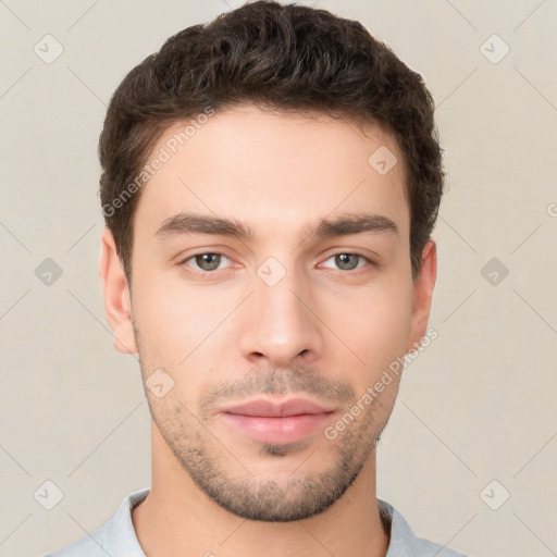 Neutral white young-adult male with short  brown hair and brown eyes