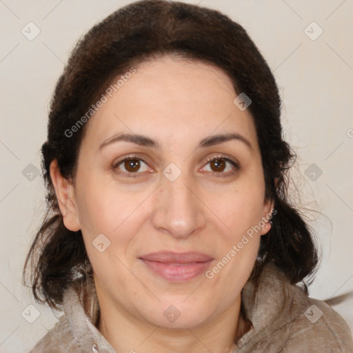 Joyful white adult female with medium  brown hair and brown eyes