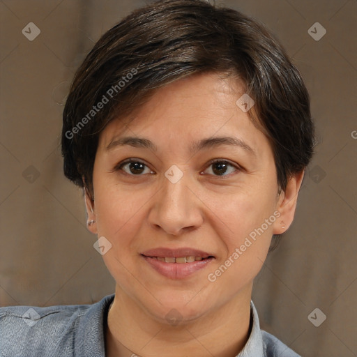 Joyful white adult female with short  brown hair and brown eyes