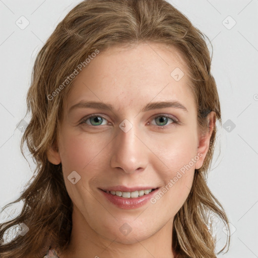 Joyful white young-adult female with long  brown hair and green eyes