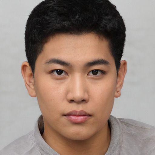 Neutral asian young-adult male with short  black hair and brown eyes