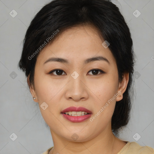 Joyful asian young-adult female with medium  brown hair and brown eyes