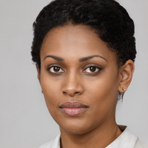 Neutral black young-adult female with short  black hair and brown eyes