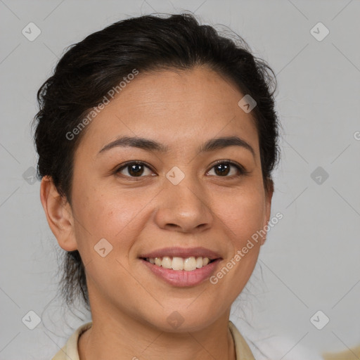 Joyful latino young-adult female with medium  brown hair and brown eyes