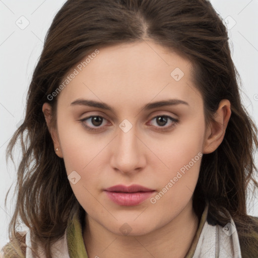 Neutral white young-adult female with long  brown hair and brown eyes