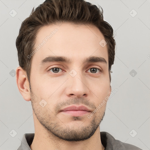 Neutral white young-adult male with short  brown hair and brown eyes