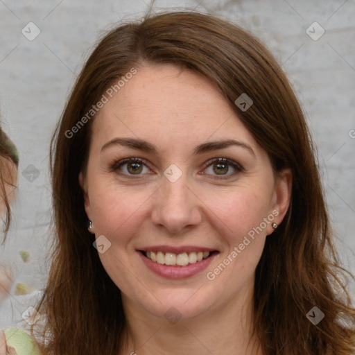 Joyful white young-adult female with long  brown hair and green eyes