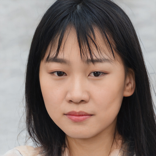 Neutral asian young-adult female with medium  brown hair and brown eyes