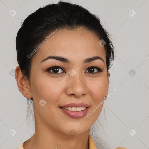 Joyful latino young-adult female with medium  brown hair and brown eyes