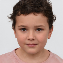 Joyful white child male with short  brown hair and brown eyes