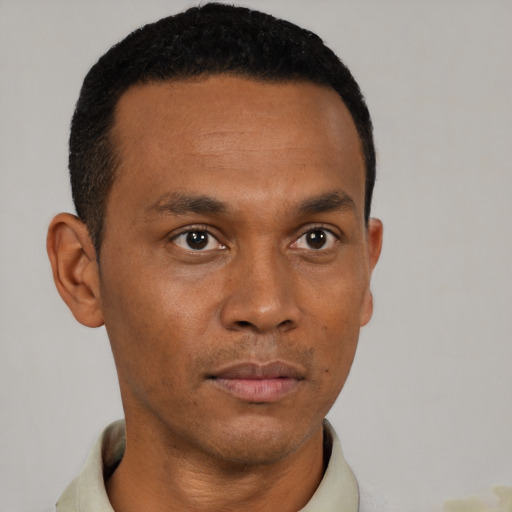Neutral black young-adult male with short  black hair and brown eyes