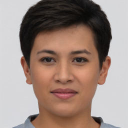 Joyful asian young-adult female with short  brown hair and brown eyes