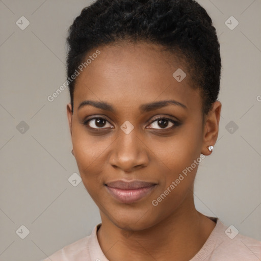 Joyful black young-adult female with short  black hair and brown eyes