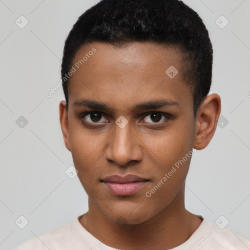 Joyful latino young-adult male with short  brown hair and brown eyes