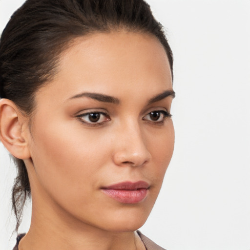 Neutral white young-adult female with medium  brown hair and brown eyes