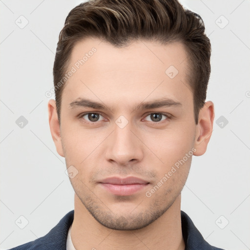 Neutral white young-adult male with short  brown hair and brown eyes