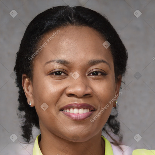 Joyful black young-adult female with medium  brown hair and brown eyes