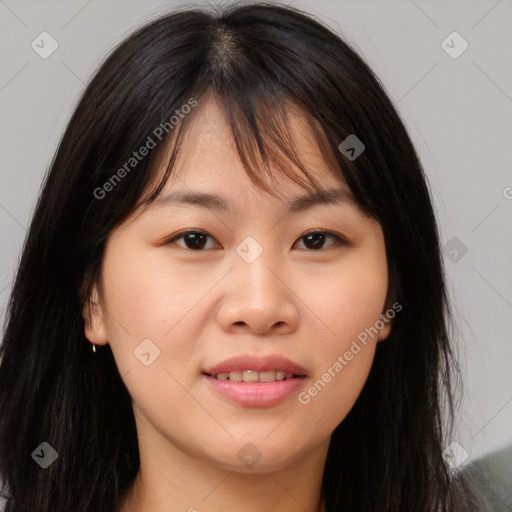 Joyful asian young-adult female with long  brown hair and brown eyes