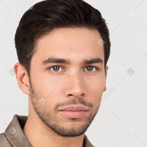 Neutral white young-adult male with short  brown hair and brown eyes