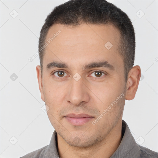 Joyful white young-adult male with short  brown hair and brown eyes