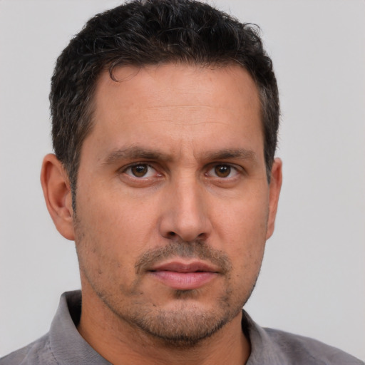 Neutral white adult male with short  brown hair and brown eyes