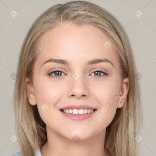 Joyful white young-adult female with long  brown hair and grey eyes