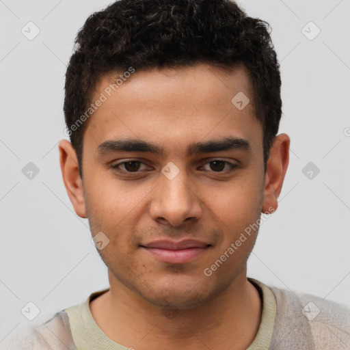 Joyful latino young-adult male with short  brown hair and brown eyes