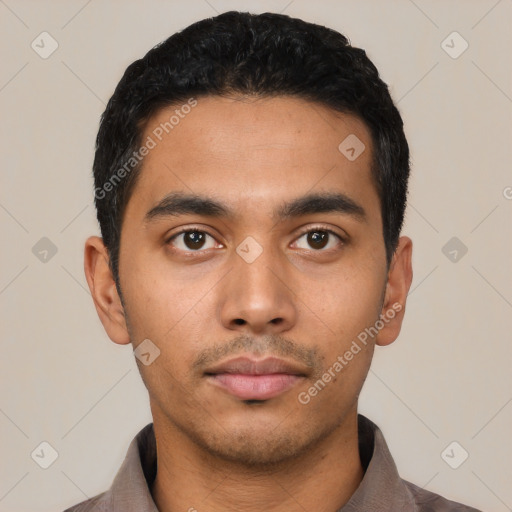 Neutral latino young-adult male with short  black hair and brown eyes