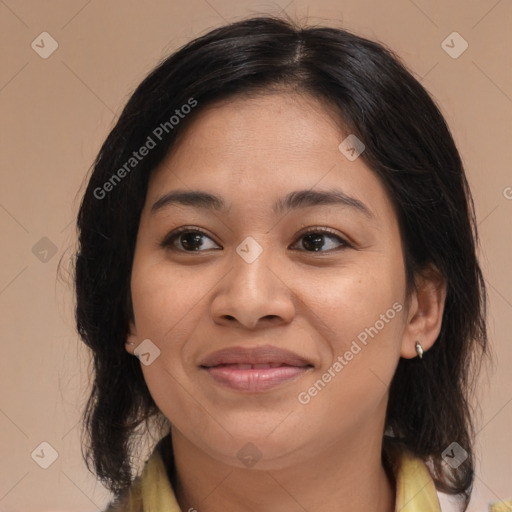 Joyful asian young-adult female with medium  brown hair and brown eyes