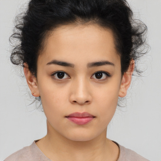Neutral latino young-adult female with medium  brown hair and brown eyes