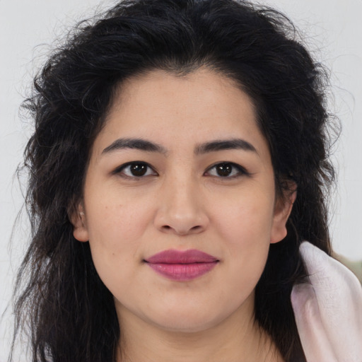 Joyful asian young-adult female with long  brown hair and brown eyes