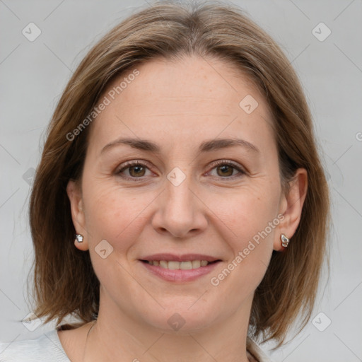 Joyful white adult female with medium  brown hair and grey eyes