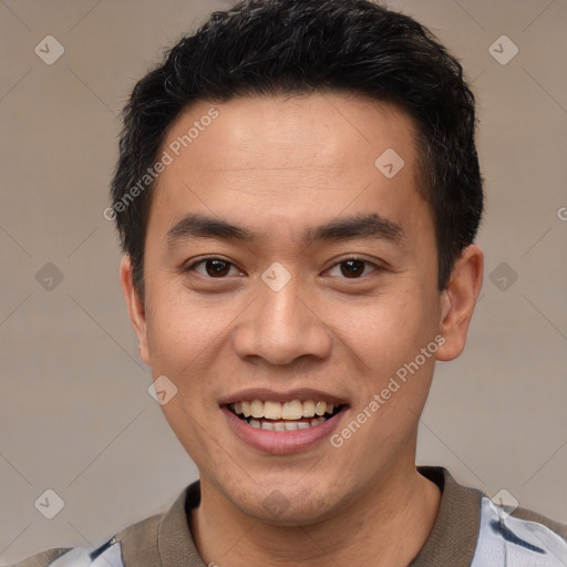 Joyful white young-adult male with short  black hair and brown eyes