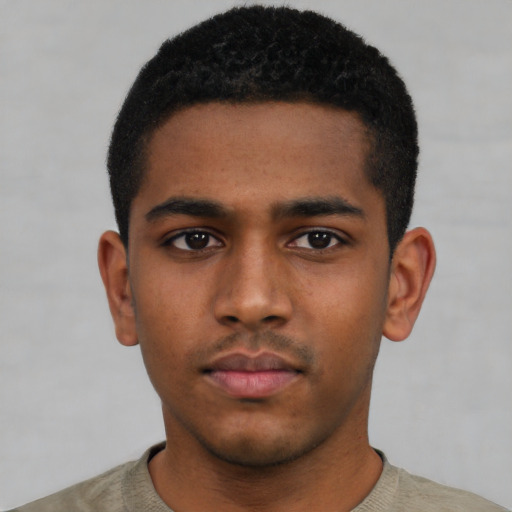 Neutral black young-adult male with short  black hair and brown eyes