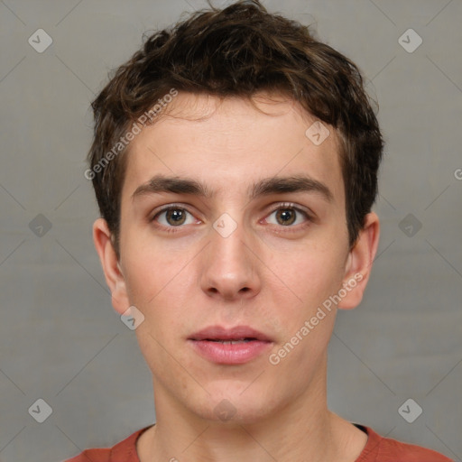 Neutral white young-adult male with short  brown hair and brown eyes