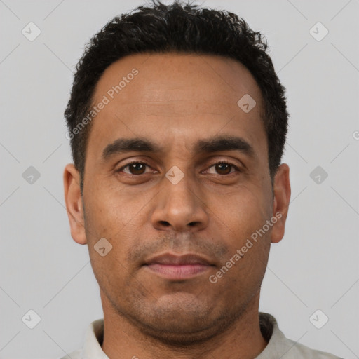 Neutral latino adult male with short  black hair and brown eyes