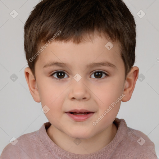 Joyful white child male with short  brown hair and brown eyes