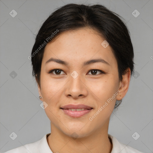 Joyful asian young-adult female with medium  brown hair and brown eyes