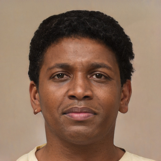 Neutral latino young-adult male with short  brown hair and brown eyes