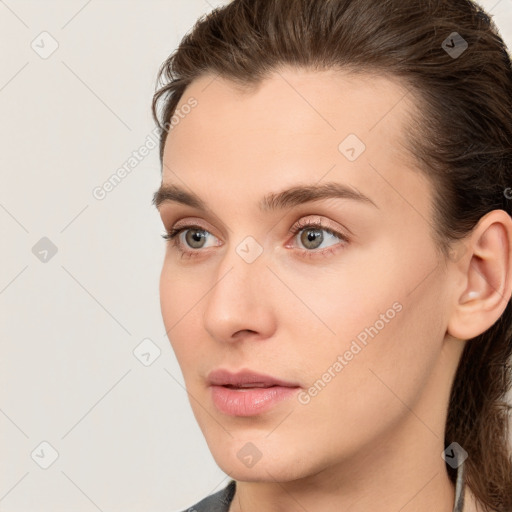 Neutral white young-adult female with medium  brown hair and brown eyes