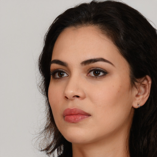 Neutral white young-adult female with long  black hair and brown eyes