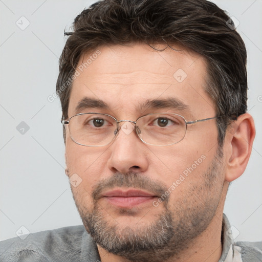 Neutral white adult male with short  brown hair and brown eyes