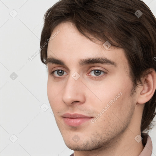 Neutral white young-adult male with short  brown hair and grey eyes