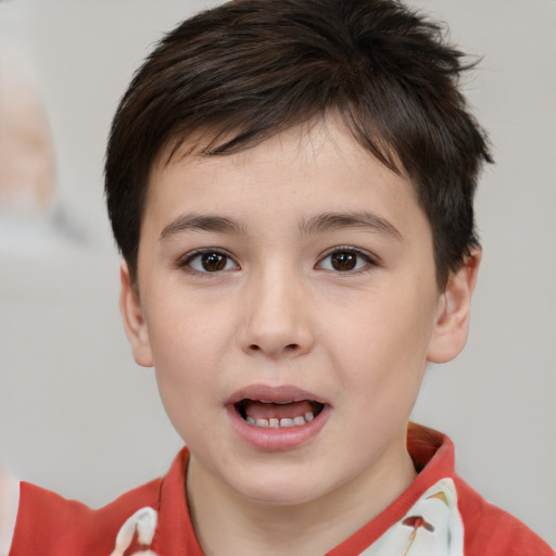 Joyful white child male with short  brown hair and brown eyes
