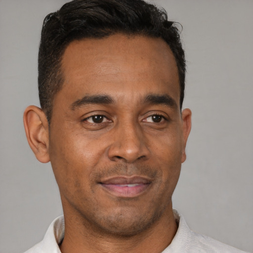 Neutral black young-adult male with short  brown hair and brown eyes