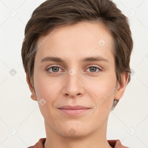 Joyful white young-adult female with short  brown hair and grey eyes