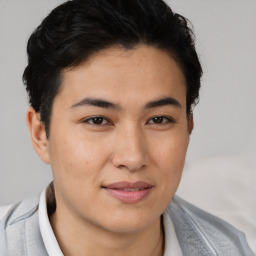 Joyful asian young-adult male with short  brown hair and brown eyes